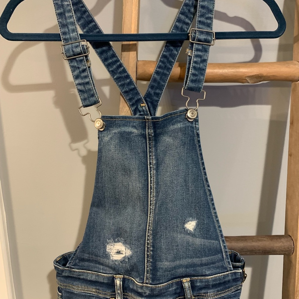 American Eagle women’s overalls size 4 distressed jegging